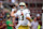 COLLEGE STATION, TEXAS - AUGUST 31: Riley Leonard #13 of the Notre Dame Fighting Irish warms up prior to the game against the Texas A&M Aggies at Kyle Field on August 31, 2024 in College Station, Texas. (Photo by Jack Gorman/Getty Images)