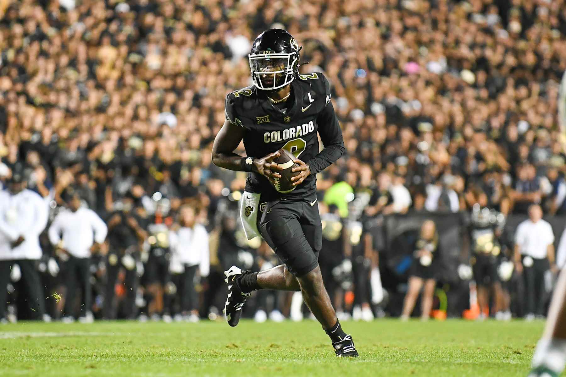 BOULDER, CO - AUGUST 29: Colorado quarterback Shedeur Sanders (2) scrambles out of the pocket looking for a receiver during the college football game between the North Dakota State Bison and the Colorado Buffaloes on August 29, 2024 at Folsom Field in Boulder, CO. (Photo by Kevin Langley/Icon Sportswire via Getty Images)