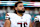 MIAMI GARDENS, FL – AUGUST 17: Sam Cosmi #76 of the Washington Commanders stands on the sidelines during the national anthem before an NFL preseason game against the Miami Dolphins at Hard Rock Stadium on August 17, 2024 in Miami Gardens, FL. (Photo by Kevin Sabitus/Getty Images)