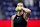 Belarus's Aryna Sabalenka prepares to throw signed tennis balls to fans after winning her women's quarterfinals match against China's Zheng Qinwen on day nine of the US Open tennis tournament at the USTA Billie Jean King National Tennis Center in New York City, on September 3, 2024. (Photo by KENA BETANCUR / AFP) (Photo by KENA BETANCUR/AFP via Getty Images)