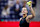 Belarus's Aryna Sabalenka prepares to throw signed tennis balls to fans after winning her women's quarterfinals match against China's Zheng Qinwen on day nine of the US Open tennis tournament at the USTA Billie Jean King National Tennis Center in New York City, on September 3, 2024. (Photo by KENA BETANCUR / AFP) (Photo by KENA BETANCUR/AFP via Getty Images)