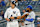 NEW YORK, NEW YORK - APRIL 13: Aaron Judge #99 of the New York Yankees and Vladimir Guerrero Jr. #27 of the Toronto Blue Jays have a laugh at first base during the first inning at Yankee Stadium on April 13, 2022 in New York City. (Photo by Jim McIsaac/Getty Images)
