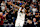 MINNEAPOLIS, MINNESOTA - MARCH 19: Anthony Edwards #5 of the Minnesota Timberwolves celebrates against the Denver Nuggets in the third quarter at Target Center on March 19, 2024 in Minneapolis, Minnesota. The Nuggets defeated the Timberwolves 115-112. NOTE TO USER: User expressly acknowledges and agrees that, by downloading and or using this photograph, User is consenting to the terms and conditions of the Getty Images License Agreement. (Photo by David Berding/Getty Images)