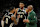 MILWAUKEE, WISCONSIN - APRIL 07: Damian Lillard #0, Giannis Antetokounmpo #34 and ead coach Doc Rivers of the Milwaukee Bucks talk during the first half of the game against the New York Knicks at Fiserv Forum on April 07, 2024 in Milwaukee, Wisconsin. NOTE TO USER: User expressly acknowledges and agrees that, by downloading and or using this photograph, User is consenting to the terms and conditions of the Getty Images License Agreement. (Photo by Patrick McDermott/Getty Images)