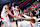 LOS ANGELES, CA - JANUARY 10: RJ Barrett #9 is helped up by his teammates Scottie Barnes #4 and Immanuel Quickley #5 of the Toronto Raptors during the game against the LA Clippers on January 10, 2024 at Crypto.Com Arena in Los Angeles, California. NOTE TO USER: User expressly acknowledges and agrees that, by downloading and/or using this Photograph, user is consenting to the terms and conditions of the Getty Images License Agreement. Mandatory Copyright Notice: Copyright 2024 NBAE (Photo by Adam Pantozzi/NBAE via Getty Images)
