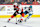 PHILADELPHIA, PENNSYLVANIA - MARCH 12: Scott Laughton #21 of the Philadelphia Flyers skates the puck against Luke Kunin #11 of the San Jose Sharks at the Wells Fargo Center on March 12, 2024 in Philadelphia, Pennsylvania. (Photo by Len Redkoles/NHLI via Getty Images)