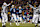 NASHVILLE, TN - JANUARY 11: Craig Hentrich #15 and Joe Nedney #6 of the Tennessee Titans react on the field after a field goal attempt during the AFC divisional playoff game against the Pittsburgh Steelers at the Coliseum on January 11, 2003 in Nashville, Tennessee. The Titans won 34-31 in overtime. (Photo by Jamie Squire/Getty Images)