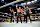 EDMONTON, CANADA - SEPTEMBER 6: Bloodline members (L-R) Tama Tonga, Solo Sikoa, Jacob Fatu and Tonga Loa stand in ring and hold up the #1 sign during WWE Friday Night SmackDown at Rogers Place on September 6, 2024 in Edmonton, Canada.  (Photo by WWE/Getty Images)