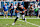 CHICAGO, IL - SEPTEMBER 08: Caleb Williams (18) of the Chicago Bears scrambles out of the pocket during the game between the Tennessee Titans and the Chicago Bears at Soldier Field on September 8, 2024 in Chicago, Illinois. (Photo by Ben Hsu/Icon Sportswire via Getty Images)