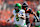 CORVALLIS, OREGON - SEPTEMBER 14: Dillon Gabriel #8 of the Oregon Ducks runs with the ball for a touchdown while pursued by Nikko Taylor #25 of the Oregon State Beavers during the first half at Reser Stadium on September 14, 2024 in Corvallis, Oregon. (Photo by Soobum Im/Getty Images)