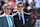 CLEVELAND, OHIO - SEPTEMBER 08: Broadcasters Kevin Burkhardt (L) and Tom Brady (R) walk along the field before the game between the Dallas Cowboys and Cleveland Browns at Cleveland Browns Stadium on September 08, 2024 in Cleveland, Ohio. (Photo by Nick Cammett/Getty Images)