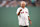 BOSTON, MA - JULY 28: Broadcaster Joe Castiglione reacts throws a ceremonial first pitch recognizing his receipt of the National Baseball Hall of Fame 2024 Ford C. Frick Award before a game between the New York Yankees and the Boston Red Sox on July 28, 2024 at Fenway Park in Boston, Massachusetts. (Photo by Maddie Malhotra/Boston Red Sox/Getty Images)