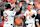 BALTIMORE, MARYLAND - JULY 30: Adley Rutschman #35 and Gunnar Henderson #2 of the Baltimore Orioles celebrate scoring in the third inning against the Toronto Blue Jays at Oriole Park at Camden Yards on July 30, 2024 in Baltimore, Maryland. (Photo by Greg Fiume/Getty Images)