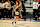 UNCASVILLE, CT - SEPTEMBER 22: Caitlin Clark #22 of the Indiana Fever dribbles the ball during the game against the Connecticut Sun during round one game one of the 2024 WNBA Playoffs on September 22, 2024 at the Mohegan Sun Arena in Uncasville, Connecticut. NOTE TO USER: User expressly acknowledges and agrees that, by downloading and or using this photograph, User is consenting to the terms and conditions of the Getty Images License Agreement. Mandatory Copyright Notice: Copyright 2024 NBAE (Photo by David Dow/NBAE via Getty Images)