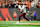 CINCINNATI, OH – SEPTEMBER 23: Jayden Daniels #5 of the Washington Commanders battles against the Cincinnati Bengals during the first half of an NFL football game at Paycor Stadium on September 23, 2024 in Cincinnati, Ohio. (Photo by Cooper Neill/Getty Images)