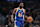 PORTLAND, OREGON - APRIL 11: Andrew Wiggins #22 of the Golden State Warriors brings the ball up court during the first quarter against the Portland Trail Blazers at Moda Center on April 11, 2024 in Portland, Oregon. NOTE TO USER: User expressly acknowledges and agrees that, by downloading and or using this photograph, User is consenting to the terms and conditions of the Getty Images License Agreement. (Photo by Amanda Loman/Getty Images)