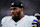 ARLINGTON, TX - SEPTEMBER 22: Micah Parsons #11 of the Dallas Cowboys watches from the sidelines prior to an NFL football game against the Baltimore Ravens at AT&T Stadium on September 22, 2024 in Arlington, Texas. (Photo by Cooper Neill/Getty Images)