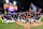 DETROIT, MI - SEPTEMBER 27:  Detroit Tigers players, coaches, staff, and a fan holding a sign pose for a team photo after the victory against the Chicago White Sox at Comerica Park on September 27, 2024 in Detroit, Michigan. The Tigers defeated the White Sox 4-1 to earn a postseason wild card berth.  (Photo by Mark Cunningham/MLB Photos via Getty Images)