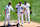CHICAGO, ILLINOIS - SEPTEMBER 01: Garrett Crochet #45 of the Chicago White Sox reacts while Miguel Vargas #20 and Lenyn Sosa #50 of the Chicago White Sox show their support during the fourth inning against the New York Mets at Guaranteed Rate Field on September 01, 2024 in Chicago, Illinois. The Mets defeated the White Sox 2-0. (Photo by Nuccio DiNuzzo/Getty Images)