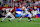 TUSCALOOSA, ALABAMA – SEPTEMBER 28: Carson Beck #15 of the Georgia Bulldogs carries the ball between Keon Sabb #3 and Deontae Lawson #0 of the Alabama Crimson Tide in the second quarter at Bryant-Denny Stadium on September 28, 2024 in Tuscaloosa, Alabama. (Photo by Todd Kirkland/Getty Images)