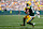 GREEN BAY, WISCONSIN - SEPTEMBER 15: Dontayvion Wicks #13 of the Green Bay Packers with the ball against the Indianapolis Colts during the first quarter at Lambeau Field on September 15, 2024 in Green Bay, Wisconsin. (Photo by Patrick McDermott/Getty Images)