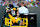 GREEN BAY, WISCONSIN - SEPTEMBER 29: Christian Watson #9 of the Green Bay Packers is carted off the field after an apparent injury during the first half of the game against the Minnesota Vikings at Lambeau Field on September 29, 2024 in Green Bay, Wisconsin. (Photo by Patrick McDermott/Getty Images)