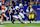 INDIANAPOLIS, IN - SEPTEMBER 29: Indianapolis Colts running back Jonathan Taylor (28) cuts back up field to avoid Pittsburgh Steelers linebacker Payton Wilson (41) during and NFL game between the Pittsburgh Steelers and the Indianapolis Colts on September 29, 2024 at Lucas Oil Stadium in Indianapolis, IN. (Photo by Jeffrey Brown/Icon Sportswire via Getty Images)