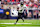 HOUSTON, TX - SEPTEMBER 29: Tank Bigsby #4 of the Jacksonville Jaguars runs with the ball agains the Houston Texans during the first half of a football game at NRG Stadium on September 29, 2024 in Houston, Texas. (Photo by Cooper Neill/Getty Images)