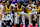 LAS VEGAS, NV - JULY 17, 2024: Los Angeles Lakers guard Bronny James (9) sits n the bench between Los Angeles Lakers forward Maxwell Lewis (21), left, and Los Angeles Lakers forward Armel Traore (37), right, during the game against the Atlanta Hawks in the NBA 2K25 Summer League game at the Thomas & Mack Center on July 17, 2024 in Las Vegas, Nevada.(Gina Ferazzi / Los Angeles Times via Getty Images)