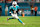 MIAMI GARDENS, FL – SEPTEMBER 30: Tyreek Hill #10 of the Miami Dolphins carries the ball in the second quarter against the Tennessee Titans at Hard Rock Stadium on September 30, 2024 in Miami Gardens, Florida. (Photo by Kevin Sabitus/Getty Images)