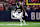 HOUSTON, TEXAS - JANUARY 13: Nico Collins #12 of the Houston Texans runs a route during an AFC wild-card playoff football game against the Cleveland Browns at NRG Stadium on January 13, 2024 in Houston, Texas. (Photo by Ryan Kang/Getty Images)