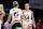 CORAL GABLES, FLORIDA - FEBRUARY 09: Hanna Cavinder #15 and Haley Cavinder #14 of the Miami Hurricanes talk on the court during the second quarter of the game against the Florida State Seminoles at Watsco Center on February 09, 2023 in Coral Gables, Florida. (Photo by Megan Briggs/Getty Images)