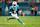 MIAMI GARDENS, FL - SEPTEMBER 30: Tyreek Hill #10 of the Miami Dolphins carries the ball during the second quarter against the Tennessee Titans at Hard Rock Stadium on September 30, 2024 in Miami Gardens, Florida. (Photo by Kevin Sabitus/Getty Images)