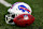 ORCHARD PARK, NY - SEPTEMBER 23: A detail shot of an official Wilson NFL football on the field next to a Buffalo Bills helmet prior to an NFL football game against the Jacksonville Jaguars at Highmark Stadium on September 23, 2024 in Orchard Park, New York. (Photo by Kevin Sabitus/Getty Images)
