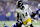 INDIANAPOLIS, INDIANA - SEPTEMBER 29: George Pickens (14) of the Pittsburgh Steelers is tackled by Julian Blackmon (32) of the Indianapolis Colts at Lucas Oil Stadium on September 29, 2024 in Indianapolis, Indiana. (Photo by Andy Lyons/Getty Images)