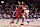 MONTREAL, CANADA - OCTOBER 06: Jonathan Mogbo #2 of the Toronto Raptors dribbles the ball against Alex Sarr #20 of the Washington Wizards during the first half of a preseason NBA game at the Bell Centre on October 6, 2024 in Montreal, Quebec, Canada. NOTE TO USER: User expressly acknowledges and agrees that, by downloading and or using this photograph, User is consenting to the terms and conditions of the Getty Images License Agreement. (Photo by Minas Panagiotakis/Getty Images)