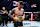 Tom Aspinall of England reacts after his knockout victory against Curtis Blaydes