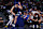 DALLAS, TX - OCTOBER 7: Zach Edey #14 of the Memphis Grizzlies celebrates scoring a basket against the Dallas Mavericks in the first half of a preseason game at American Airlines Center on October 7, 2024 in Dallas, Texas. NOTE TO USER: User expressly acknowledges and agrees that, by downloading and or using this photograph, User is consenting to the terms and conditions of the Getty Images License Agreement. (Photo by Ron Jenkins/Getty Images)