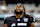 LAS VEGAS, NEVADA – SEPTEMBER 22: Wide receiver Davante Adams #17 of the Las Vegas Raiders stretches before an NFL football game against the Carolina Panthers at Allegiant Stadium on September 22, 2024 in Las Vegas, Nevada. (Photo by Brooke Sutton/Getty Images)