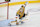 LAS VEGAS, NEVADA - OCTOBER 09: Adin Hill #33 of the Vegas Golden Knights tends net during the third period against the Colorado Avalanche at T-Mobile Arena on October 09, 2024 in Las Vegas, Nevada. (Photo by Zak Krill/NHLI via Getty Images)
