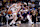 PALM SPRINGS, CALIFORNIA - OCTOBER 06: Dalton Knecht #4 of the Los Angeles Lakers looks for an opening against Royce O'Neale #00 of the Phoenix Suns in the second quarter at Acrisure Arena on October 06, 2024 in Palm Springs, California. NOTE TO USER: User expressly acknowledges and agrees that by downloading and/or using this photograph, User is agreeing to the terms and conditions of the Getty Images License Agreement. (Photo by Katelyn Mulcahy/Getty Images)