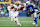 SEATTLE, WASHINGTON - OCTOBER 10: Jordan Mason #24 of the San Francisco 49ers runs the ball against Devon Witherspoon #21 of the Seattle Seahawks during the first quarter at Lumen Field on October 10, 2024 in Seattle, Washington. (Photo by Steph Chambers/Getty Images)