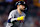 MINNEAPOLIS, MINNESOTA - AUGUST 26: Travis d'Arnaud #16 of the Atlanta Braves celebrates his two-run home run as he rounds the bases against the Minnesota Twins in the second inning at Target Field on August 26, 2024 in Minneapolis, Minnesota. (Photo by David Berding/Getty Images)