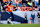 DENVER, COLORADO - OCTOBER 13: Place kicker Wil Lutz #3 of the Denver Broncos attempts an onside kick during the fourth quarter of an NFL football game against the Los Angeles Chargers at Empower Field at Mile High on October 13, 2024 in Denver, Colorado. (Photo by Brooke Sutton/Getty Images)