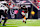 HOUSTON, TX - SEPTEMBER 29: Cam Akers #22 of the Houston Texans runs the ball during an NFL football game against the Jacksonville Jaguars at NRG Stadium on September 29, 2024 in Houston, Texas. (Photo by Cooper Neill/Getty Images)