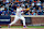 NEW YORK, NEW YORK - OCTOBER 18: Pete Alonso #20 of the New York Mets watches after hitting a three-run home run in the first inning against the Los Angeles Dodgers during Game Five of the National League Championship Series at Citi Field on October 18, 2024 in New York City. (Photo by Al Bello/Getty Images)