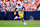 DENVER, COLORADO - OCTOBER 13: Running back J.K. Dobbins #27 of the Los Angeles Chargers carries the ball during the third quarter of an NFL football game against the Denver Broncos at Empower Field at Mile High on October 13, 2024 in Denver, Colorado. (Photo by Brooke Sutton/Getty Images)