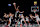NEW YORK, NEW YORK - OCTOBER 20: Jonquel Jones #35 of the New York Liberty and Kayla McBride #21 of the Minnesota Lynx tip off to start Game Five of the WNBA Finals at Barclays Center on October 20, 2024 in the Brooklyn borough of New York City. The New York Liberty defeated the Minnesota Lynx 67-62 in overtime to win the championship. NOTE TO USER: User expressly acknowledges and agrees that, by downloading and or using this photograph, User is consenting to the terms and conditions of the Getty Images License Agreement. (Photo by Elsa/Getty Images)