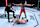 Max Holloway stands over Chan Sung Jung after a knockdown