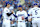 LOS ANGELES, CALIFORNIA - OCTOBER 13: Shohei Ohtani #17 and Mookie Betts #50 of the Los Angeles Dodgers meet before Game One of the Championship Series against the New York Mets at Dodger Stadium on October 13, 2024 in Los Angeles, California. (Photo by Sean M. Haffey/Getty Images)